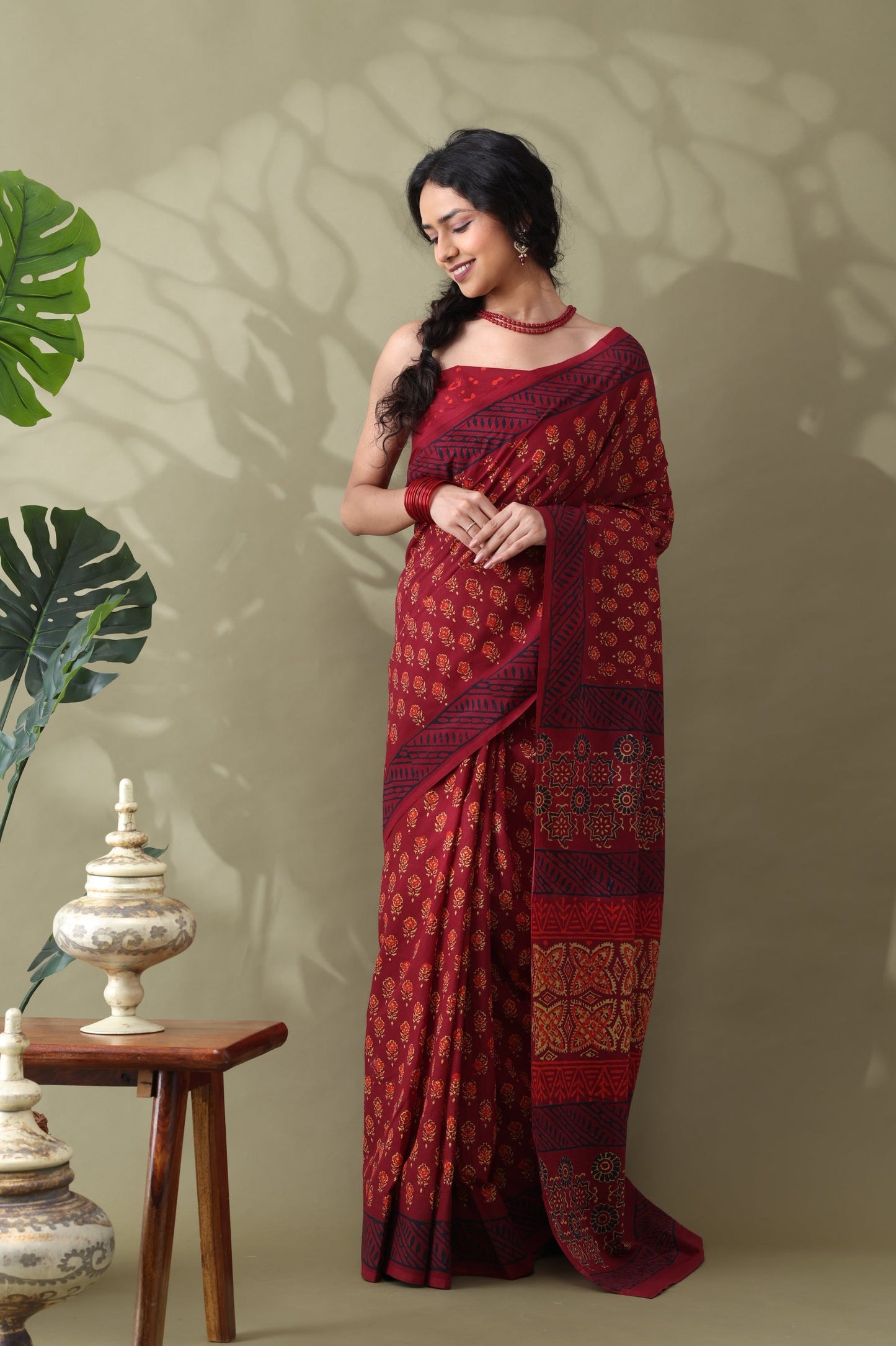 Navya Wine Red Floral Motif Cotton Saree.