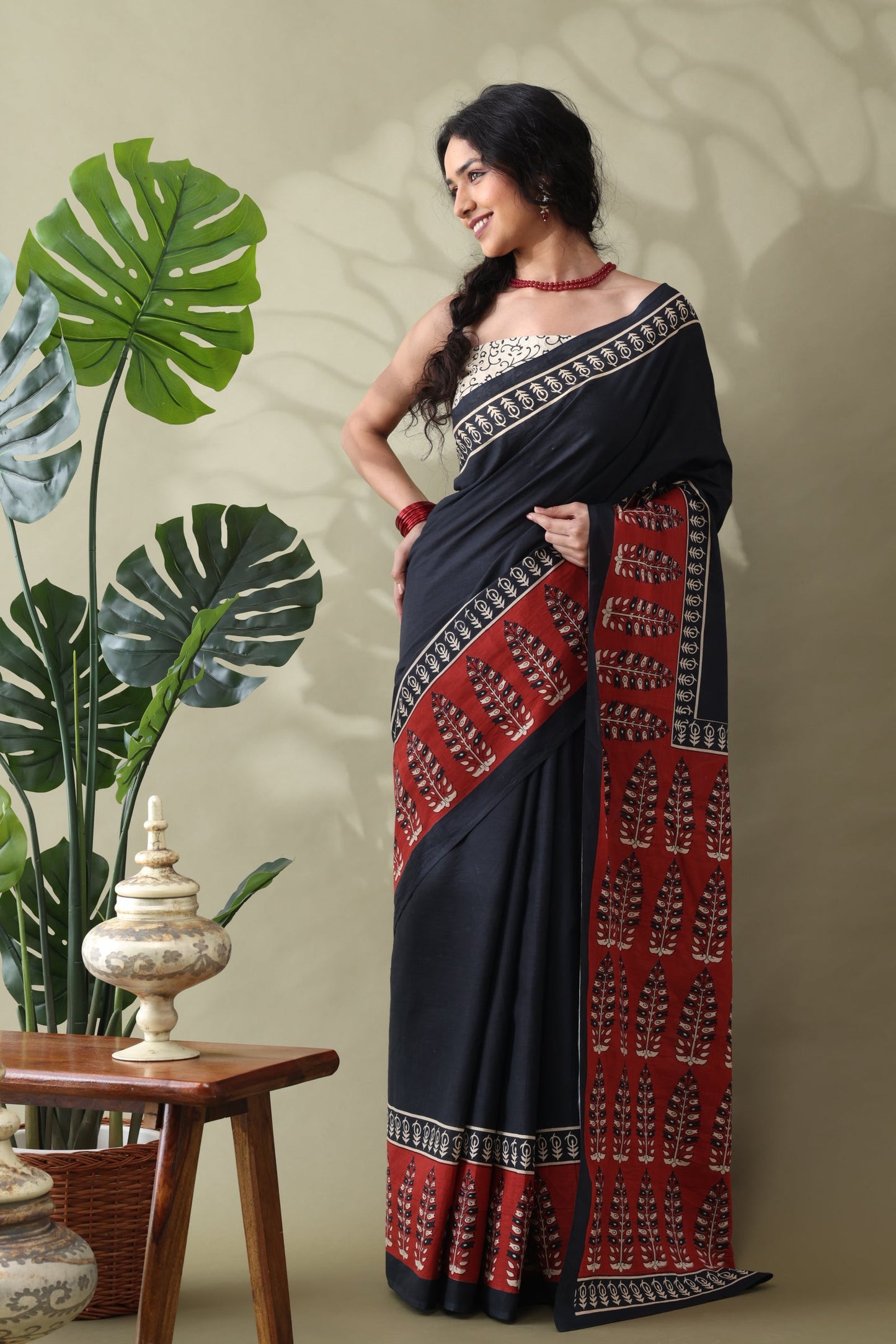 Navya Black Rust Border Cotton Saree.
