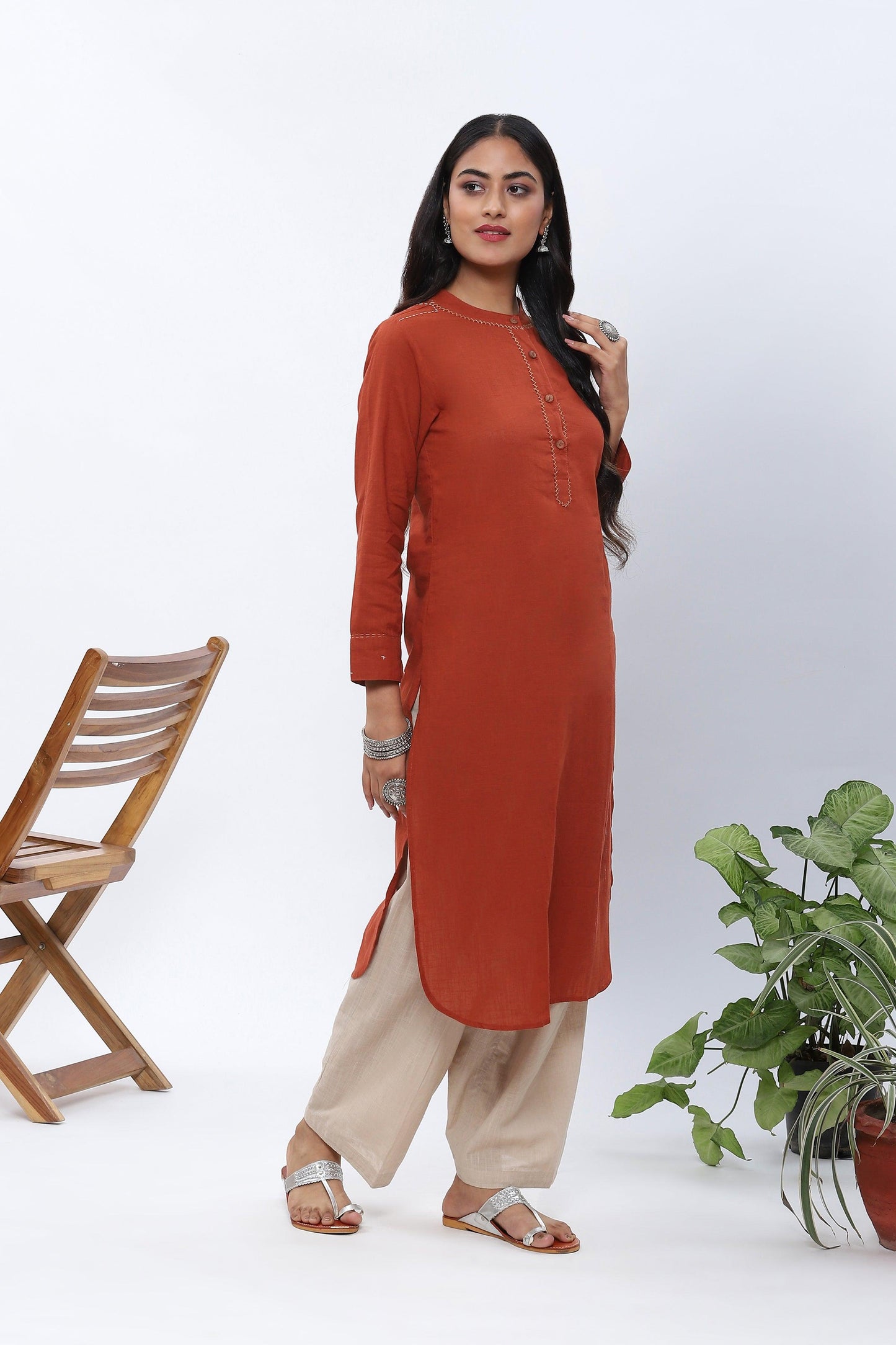 Shravani Rustic Orange Kurta with Beige Pants