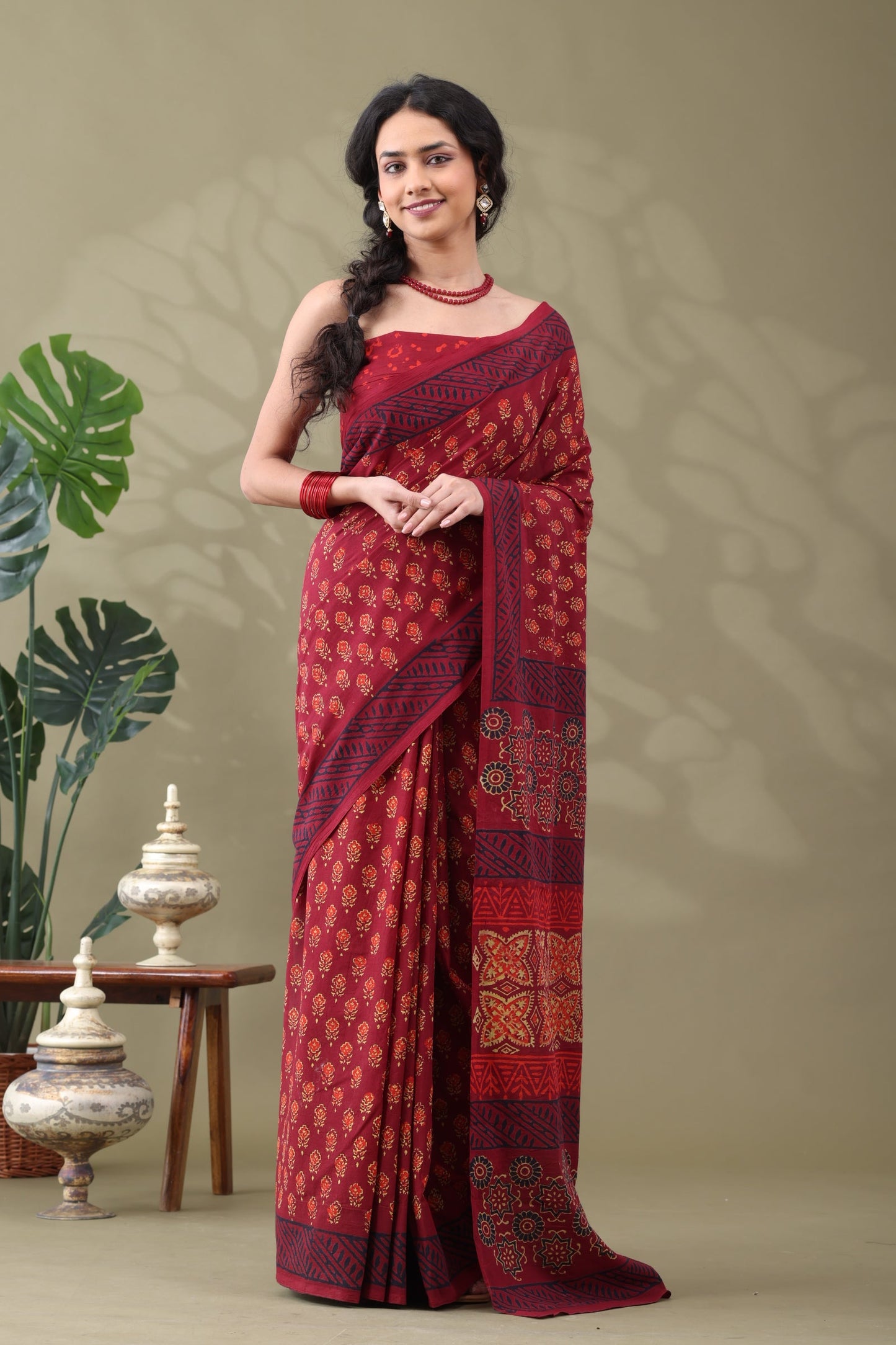 Navya Wine Red Floral Motif Cotton Saree.