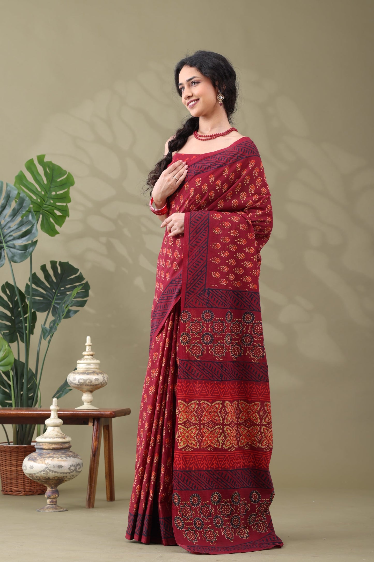 Navya Wine Red Floral Motif Cotton Saree.