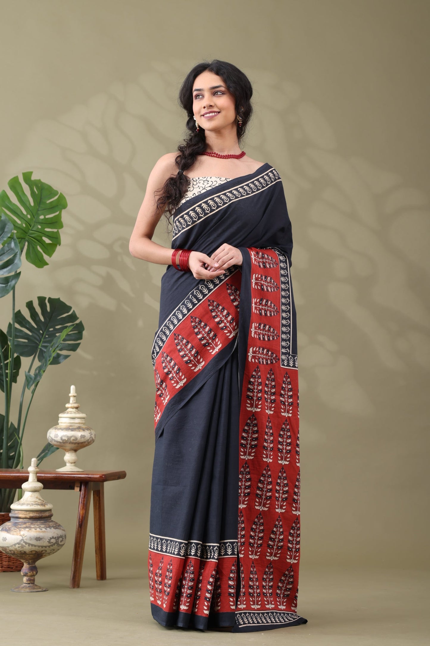 Navya Black Rust Border Cotton Saree.