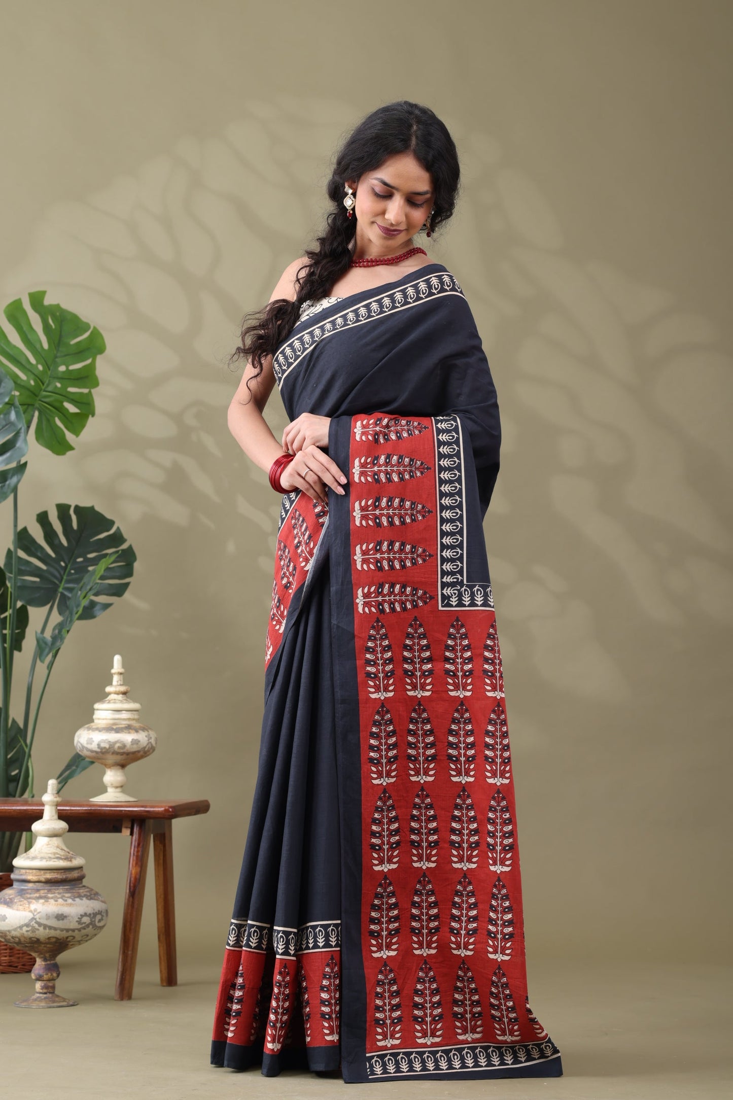 Navya Black Rust Border Cotton Saree.